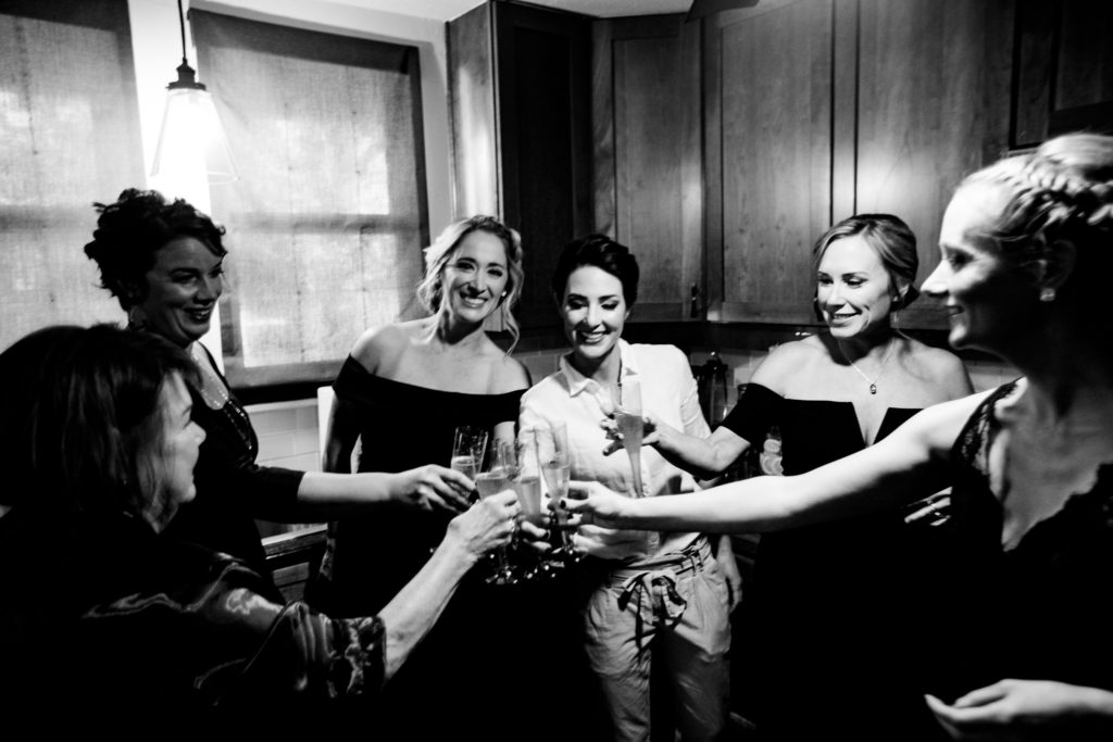 Bride toasting with bridesmaids