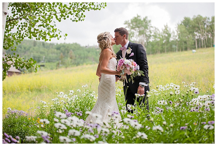 First look kiss at The Ritz in Beaver Creek Summer Ritz Carlton Wedding