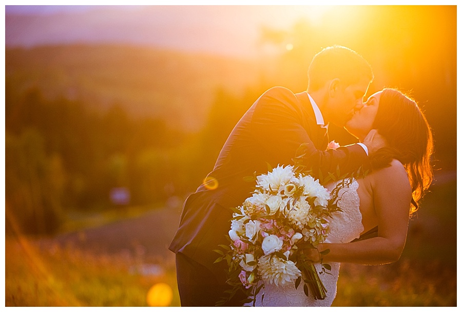 Kiss photo of bride and groom during sunset at Gorrono Ranch