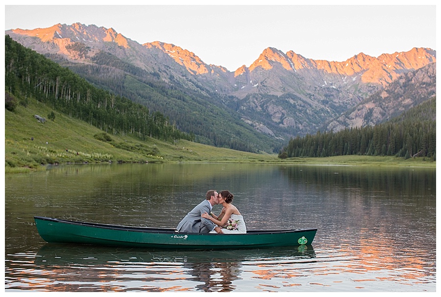 26 Bride and Groom on a canoe Piney River Ranch