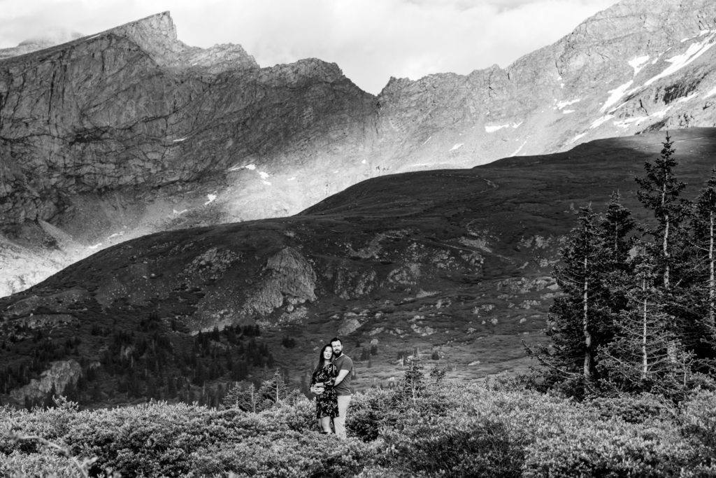 Black and White engagement photos in the mountain with wildflowers