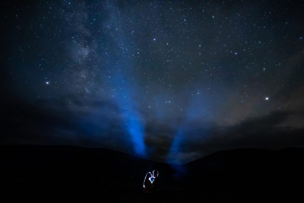 Engagement pictures with stars, camping engagement session