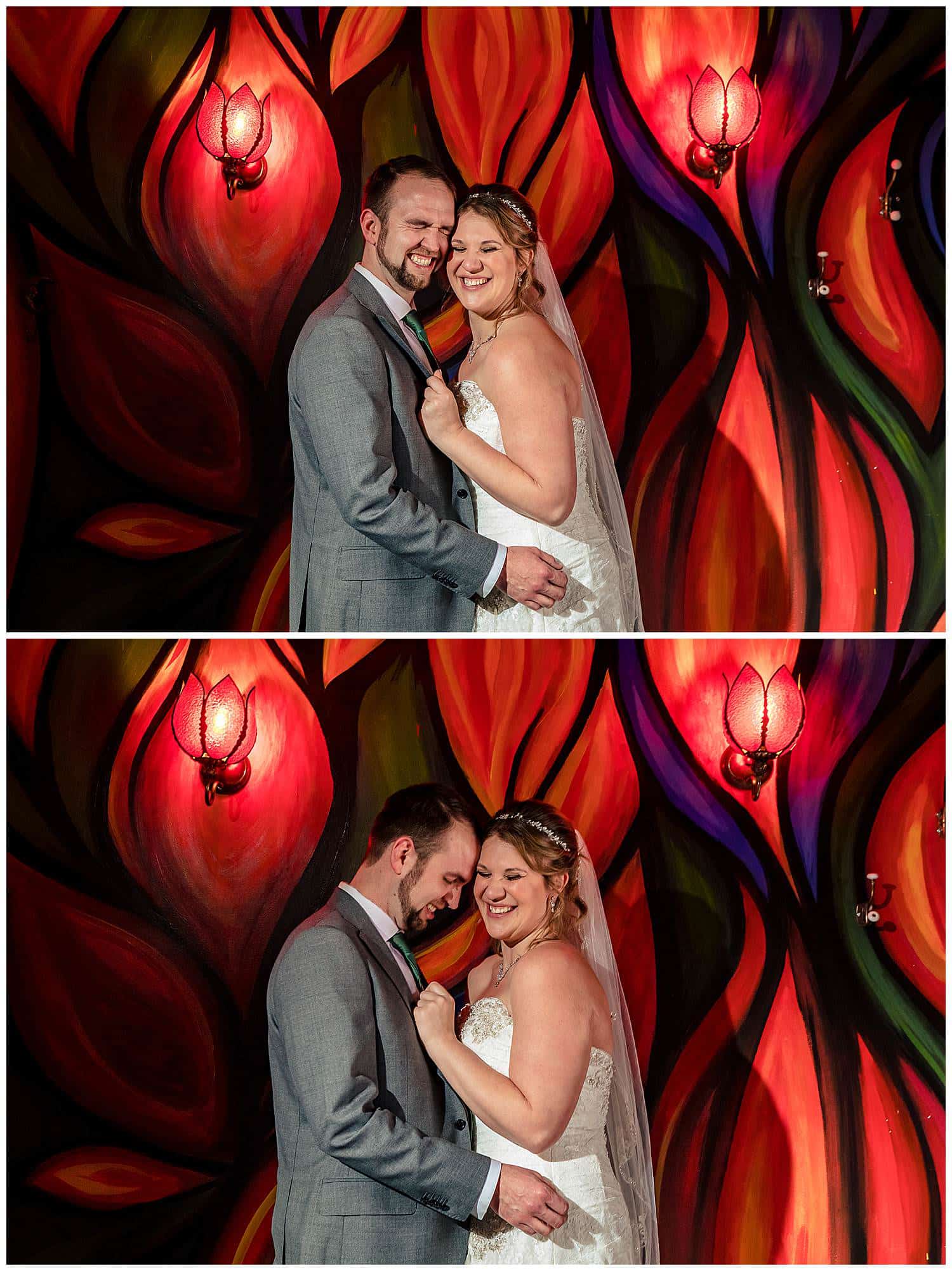 Bride and Groom in front of unique art wall